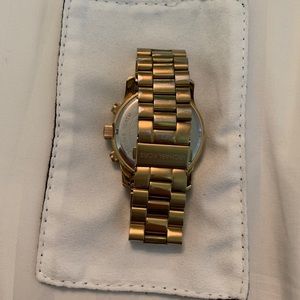 Gold women’s Michael Kors Watch